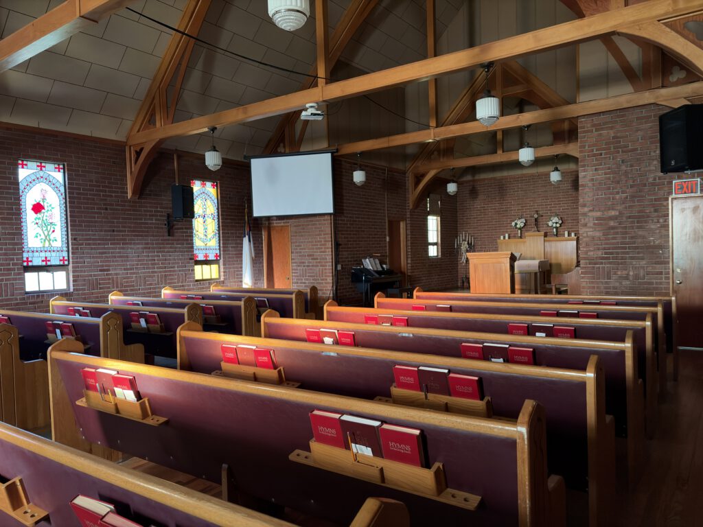 Wide interior view of Adrian Community Church sanctuary